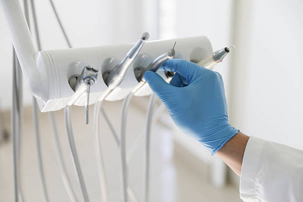 Professional Tooth Extraction technician working in Camp Croft, SC